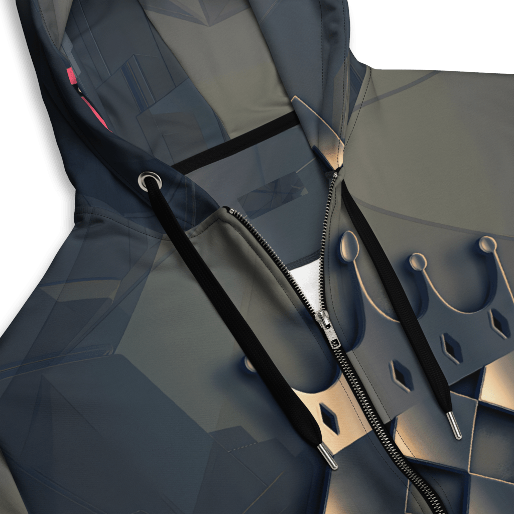 Close-up of a stylish hoodie featuring a geometric design with a crown motif, showcasing a blend of dark and metallic colors.
